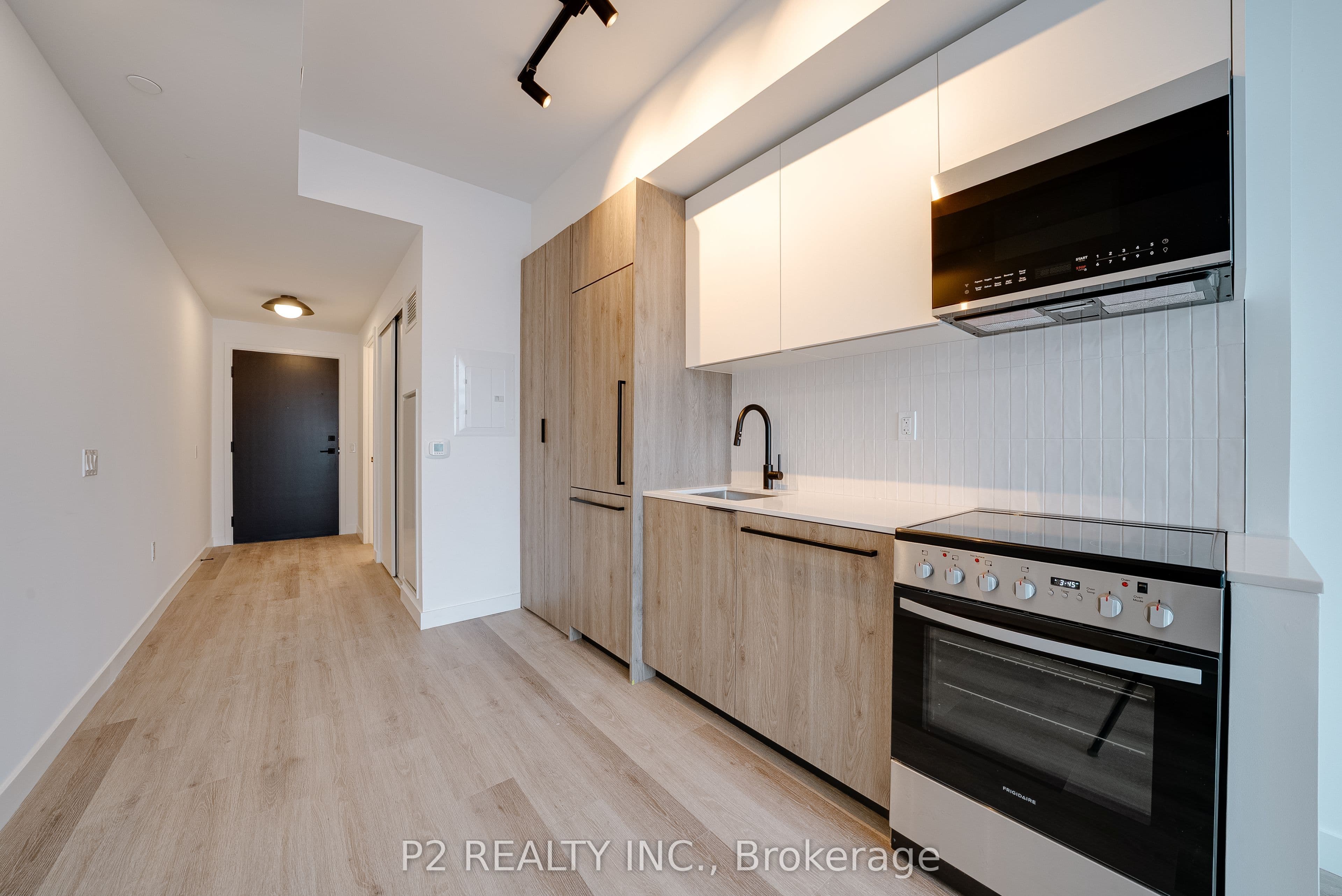 Unit 217 1635 MILITARY Trail photo 1