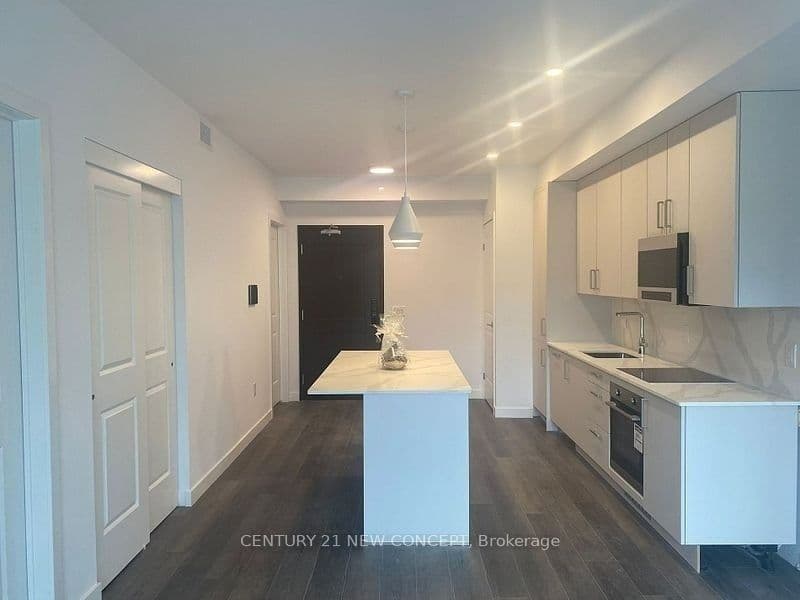 Unit 212 7549B Kalar Road photo 1